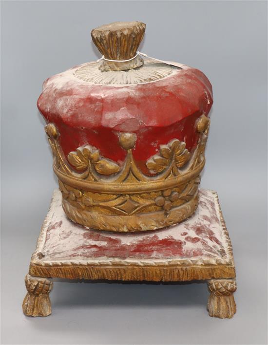 A carved painted wood crown